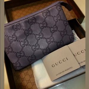 Gucci embossed leather pouch...great condition!